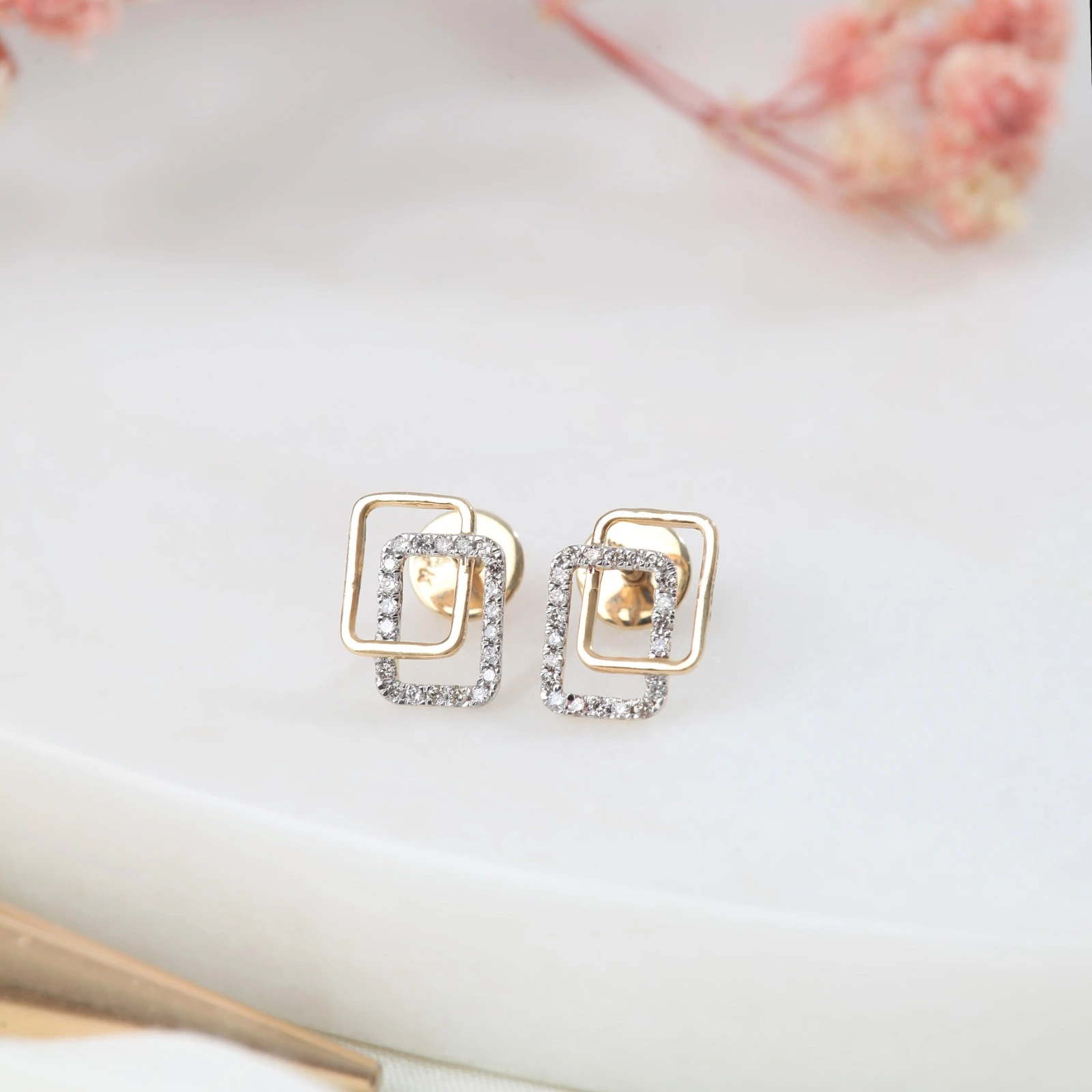 double-quadrennium-earrings-tops